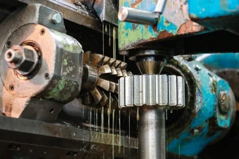 Processing of metal detail on the old machine. Stock Photos