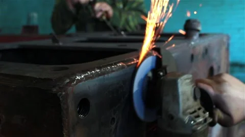 Processing of metal grinder with sparks Stock Footage 55584576