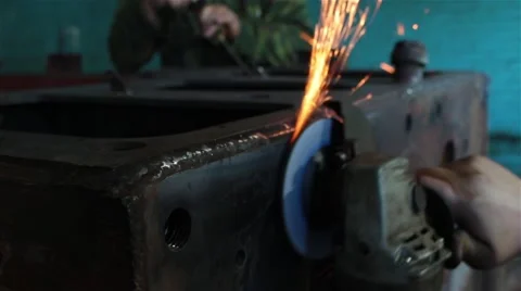 Processing of metal grinder with sparks Stock Footage 55584754