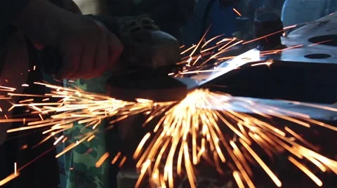 Processing of metal grinder with sparks Stock Footage 55584949