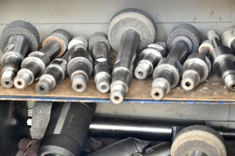 Processing of metal by grinding on a flat grinding machine Stock Photos