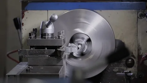 Processing of metal on a lathe. Mechanics working. 動画素材 74832376