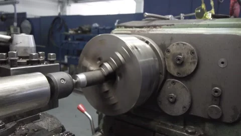 Processing a metal part in a CNC machine. Lathe, cnc machine. CNC lathe machine. Stock Footage 169414415