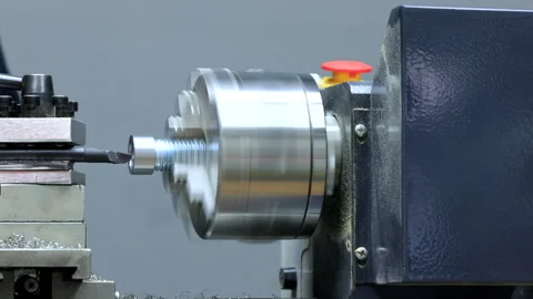 Processing a metal product on a lathe Stock Footage 286062177