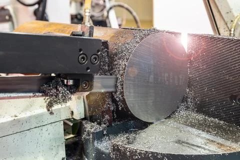 Processing of a part on a band saw machine. designed for cutting Stock Photos
