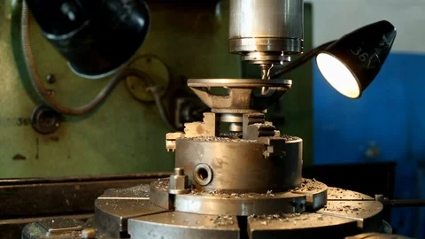 Processing of parts on an old lathe in a factory workshop Stock Footage 115086248