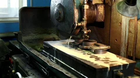 Processing of parts on an old lathe in a factory workshop Stock Footage 115086254