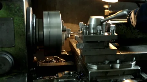 Processing of parts on an old lathe in a factory workshop Stock Footage 115086338