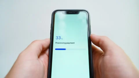 Processing payment on smartphone screen. Payment declined error message appears Stock Footage 343238300
