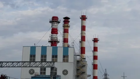 Processing plant pipes against the sky Video stock 306154875