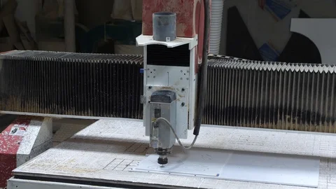 Processing of plastic with a milling machine at the factory. CNC milling machine Stock Footage 99540832