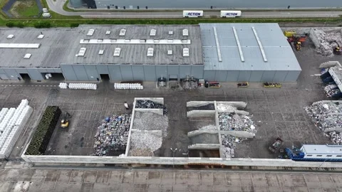 Processing plastic waste at recycling facility for sustainable management Stock Footage 337984472