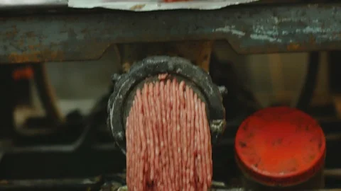 Processing of pork meat minced in a meat grinder. Stock-Footage 94218665