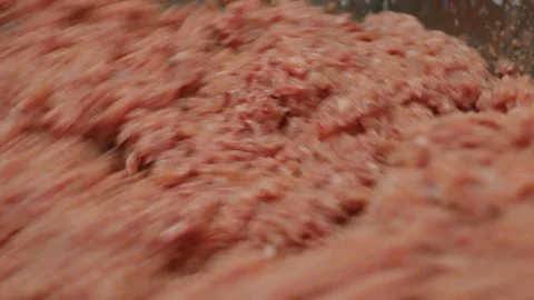Processing of pork meat minced in a meat grinder. Stock Footage 94218807