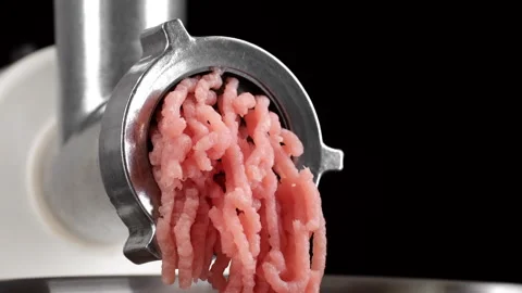 Processing pork meat in minced meat on a meat grinder Video stock 267682461