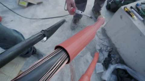 Processing of power cable in the constru... | Stock Video | Pond5