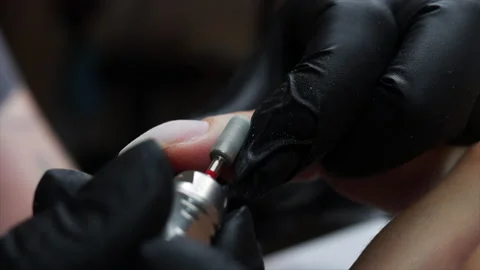Processing of rough cuticles and lateral folds of nails Stock Footage 207132876