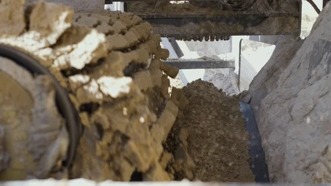 Processing of sand and ground. Machines working and conveyor line transporting Видео 101031195