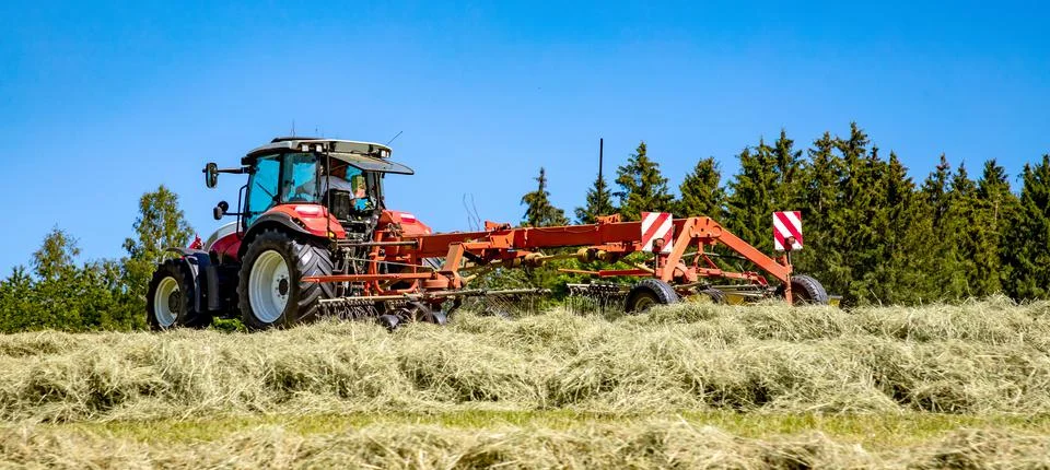 Processing silage with tractor Stock Photos