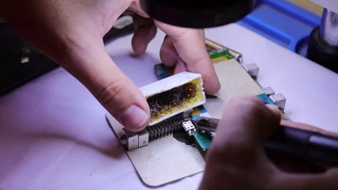 Processing the soldering iron of the board for the tablet Stock Footage 293190974