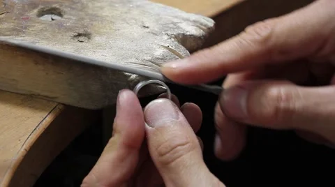 Processing the surface of the billets for silver ring with a file(tool) Video stock 56581120