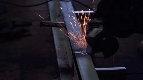 Processing the weld with a grinding machine. Stock Footage 153771287