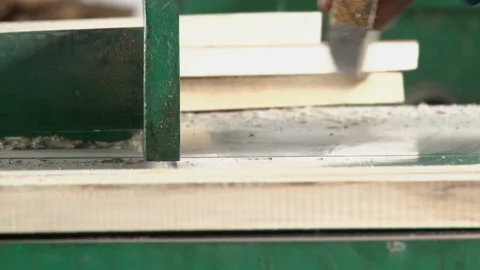 Processing the workpiece of wooden plank by jointing machine Stock Footage 148303784