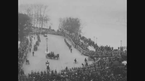 Procession crosses Pont Alexandre III into place de la Concorde - 1918 Stock Footage 83703308