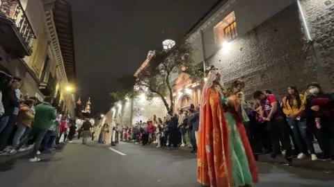 "Procession de la luz" - People celebrating Holy Week in Quito, Ecuador Stock Footage 308358325