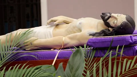 Procession of Good Friday - Symbol of Jesus Laying Down in a Car Roof Stock Footage 237787293