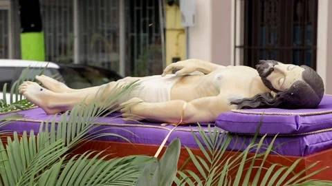 Procession of Good Friday - Symbol of Jesus Laying Down in a Car Roof Stock Footage 237787613