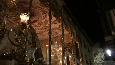 Procession of holy week in granada. Virgin in procession through the streets Stock Footage 178489264
