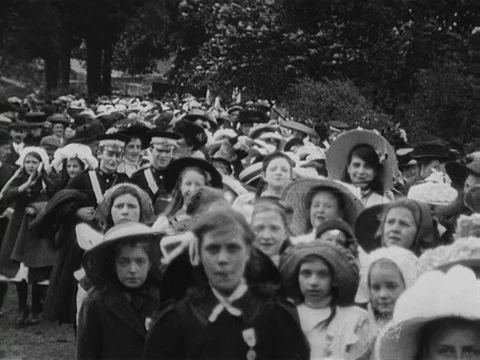 Procession of people celebrating the coronation of King George V, UK 1911 Stock Footage 136675751