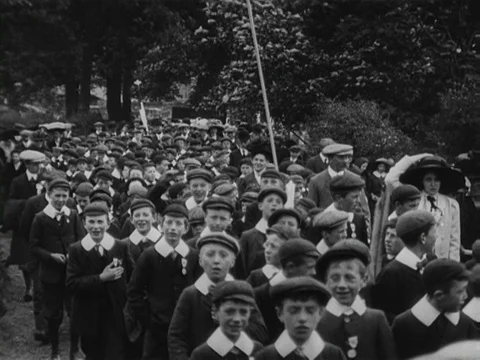 Procession of people celebrating the coronation of King George V, UK 1911 Stock Footage 136675792
