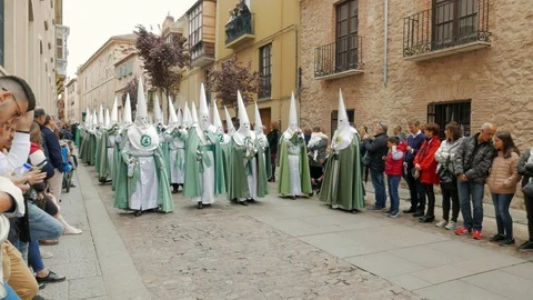 Procession of the Virgen de la Esperanza Brotherhood on Holy Thursday  through Stock Footage 106602602