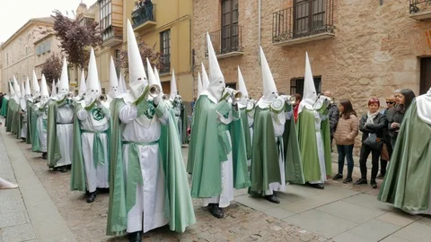 Procession of the Virgen de la Esperanza Brotherhood on Holy Thursday  through Stock Footage 106602625