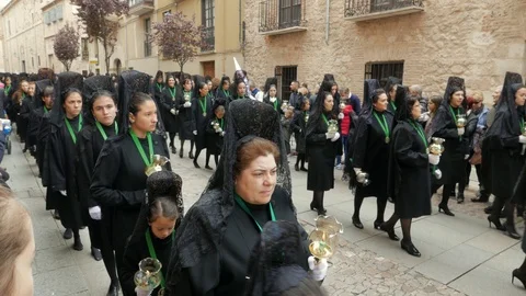 Procession of the Virgen de la Esperanza Brotherhood on Holy Thursday  through Stock Footage 106602692