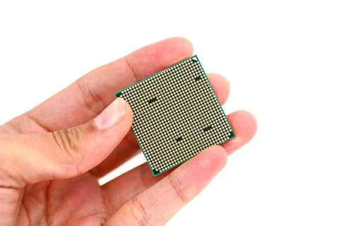 Processor back back of the microprocessor in hand isolated on white backgr... Foto stock