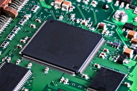 Processor chip on computer mainboard Stock Photos