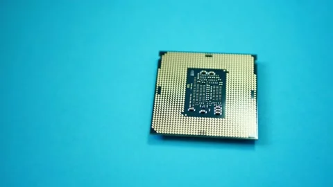 Processor chip CPU closeup isolated on green background Stock Footage 151466230