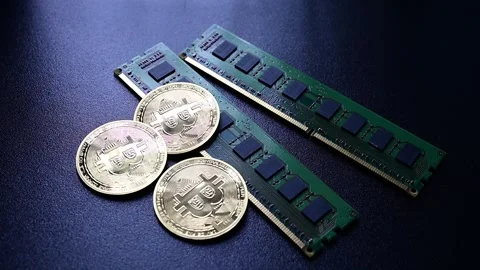Processor chip placed beside bitcoin and computer memory representing technology Stock Footage 331188677
