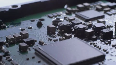 Processor, chips and capacitors on electronic circuit board Stock Footage 305115734