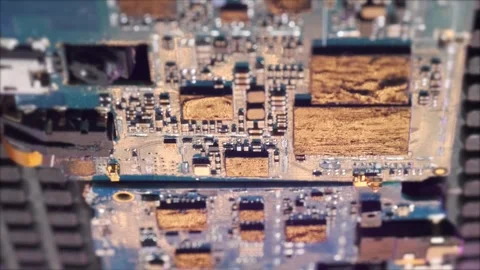 Processor chips, metal scorched microchip tracking shot top view Stock Footage 270453986
