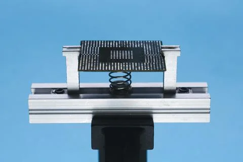 Processor from a computer on a blue background. computer repair Stock Photos