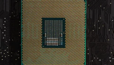Processor on computer hardware. Circuit board in close-up background with pro Stockfoto's
