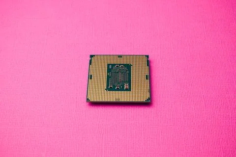 Processor for computer isolated on a colored background Stock Photos