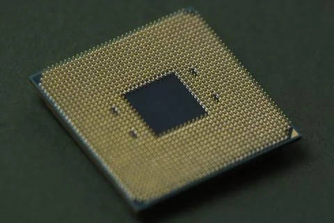 Processor for a computer lies on a green isolated background Stock Photos