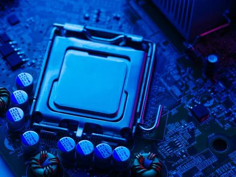 Processor, desktop microprocessor on a blue surface close-up. Semiconductor c Stock Photos