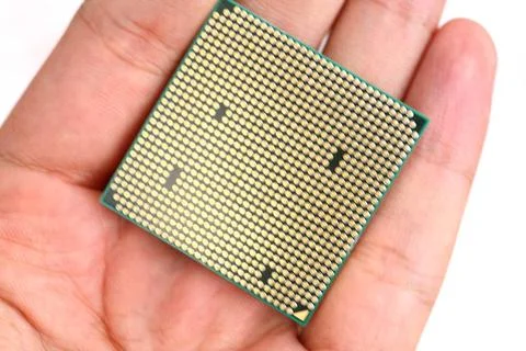 Processor in the hand Processor in the hand - Closeup of a computer proces... 스톡 사진