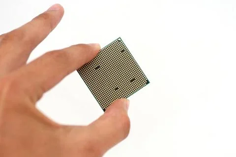 Processor in the hand Processor in the hand Closeup of a computer processo... 写真素材